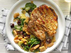Dry-Rub Grilled Pork Chops over Cannellini Greens | Lotus Grill