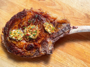 Caveman Tomahawk Rib-Eye with Chipotle-Lime Compound Butter  | Lotus Grill